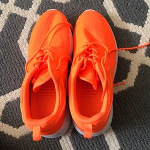 Bright orange Nike shoes!